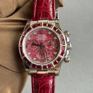 Rolex chronograph with red textured dial, diamond hour markers, ruby-red bezel, and red leather strap.