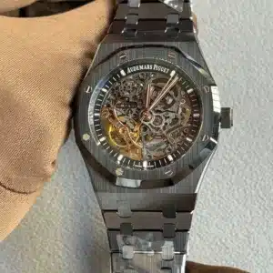 Skeleton-style Audemars Piguet wristwatch with visible gears through a transparent dial on a metal bracelet